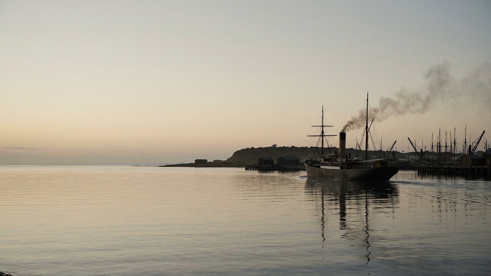 A steamship silhouette leaving Durban harbour at dusk. Illustration.